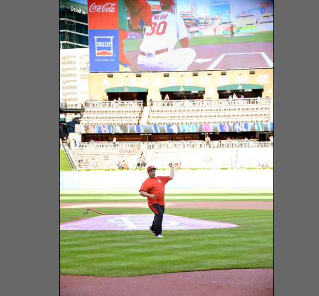 Mark Mason throwing out the first pitch at the Cardinals game on September 2018.